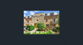 Отель Caulta Apartments  Сидней